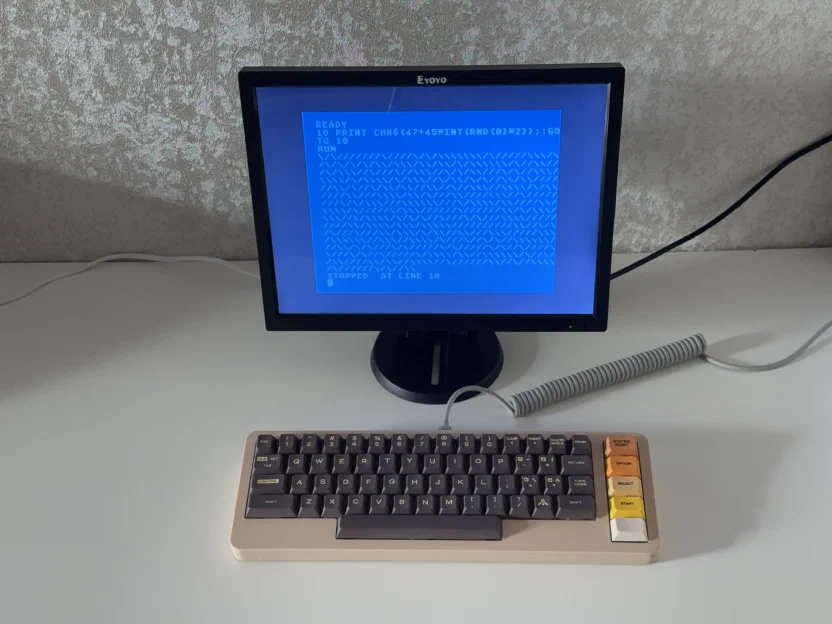 Atari Boy keyboard connected to a monitor running an Atari 800 emulator